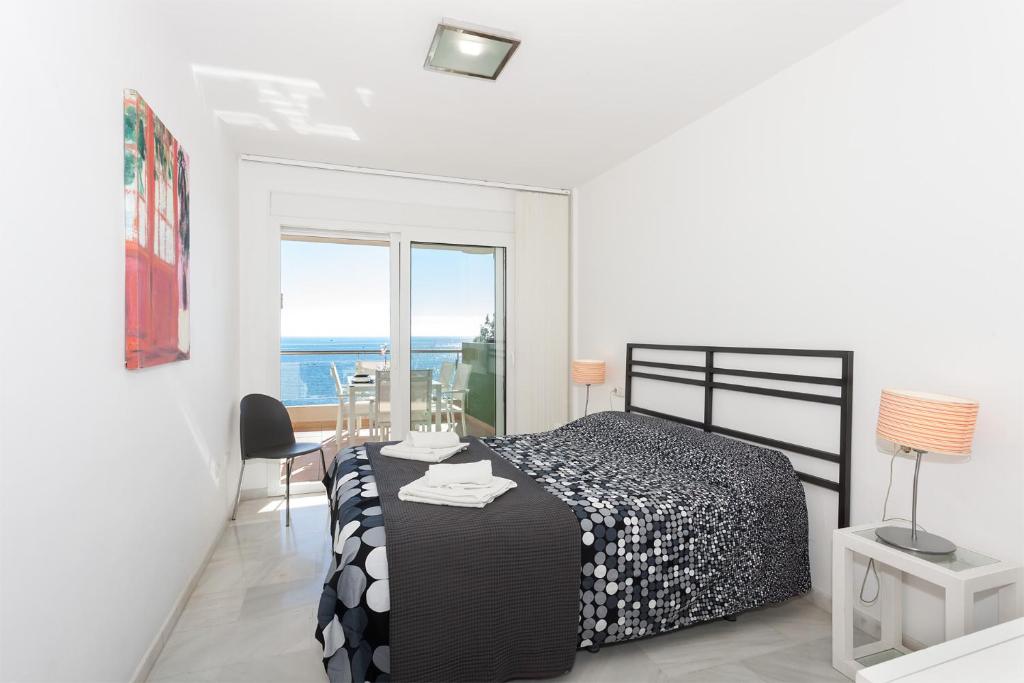 Posteľ alebo postele v izbe v ubytovaní Apartamento SAN FERMIN