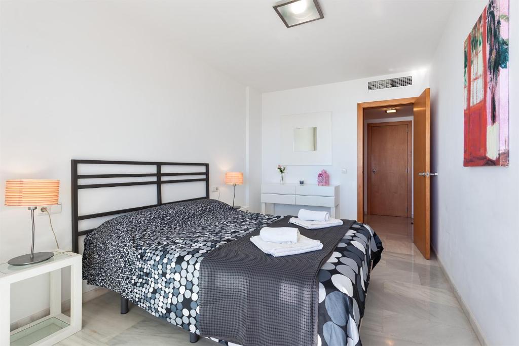 Posteľ alebo postele v izbe v ubytovaní Apartamento SAN FERMIN