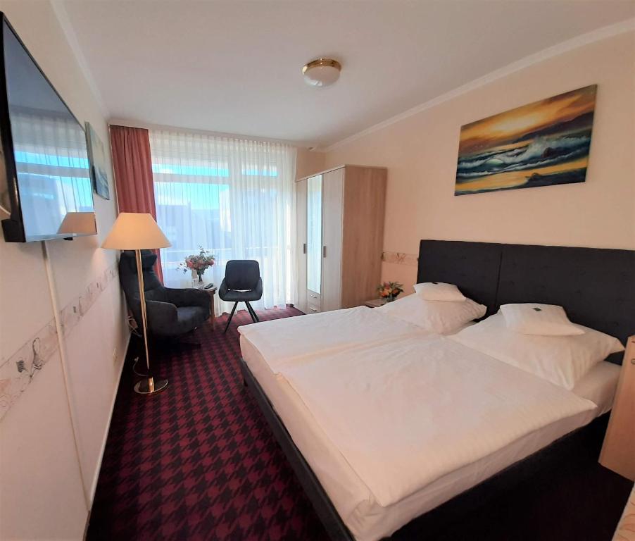 Postel nebo postele na pokoji v ubytování Hotel Krupp