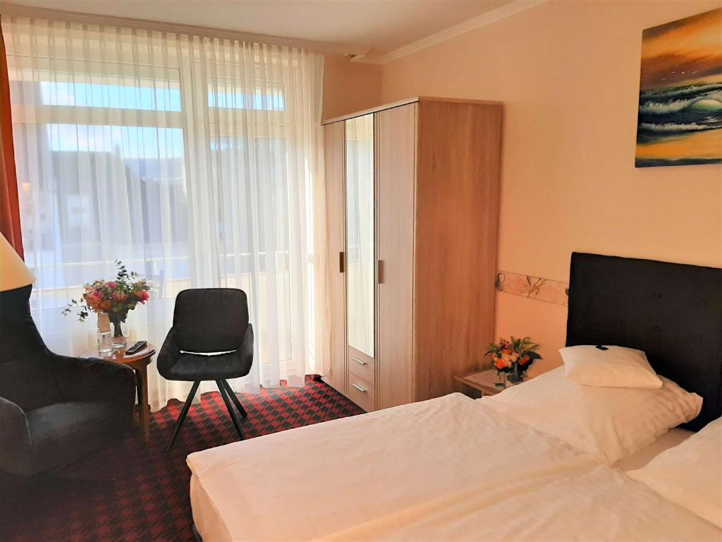 Postel nebo postele na pokoji v ubytování Hotel Krupp