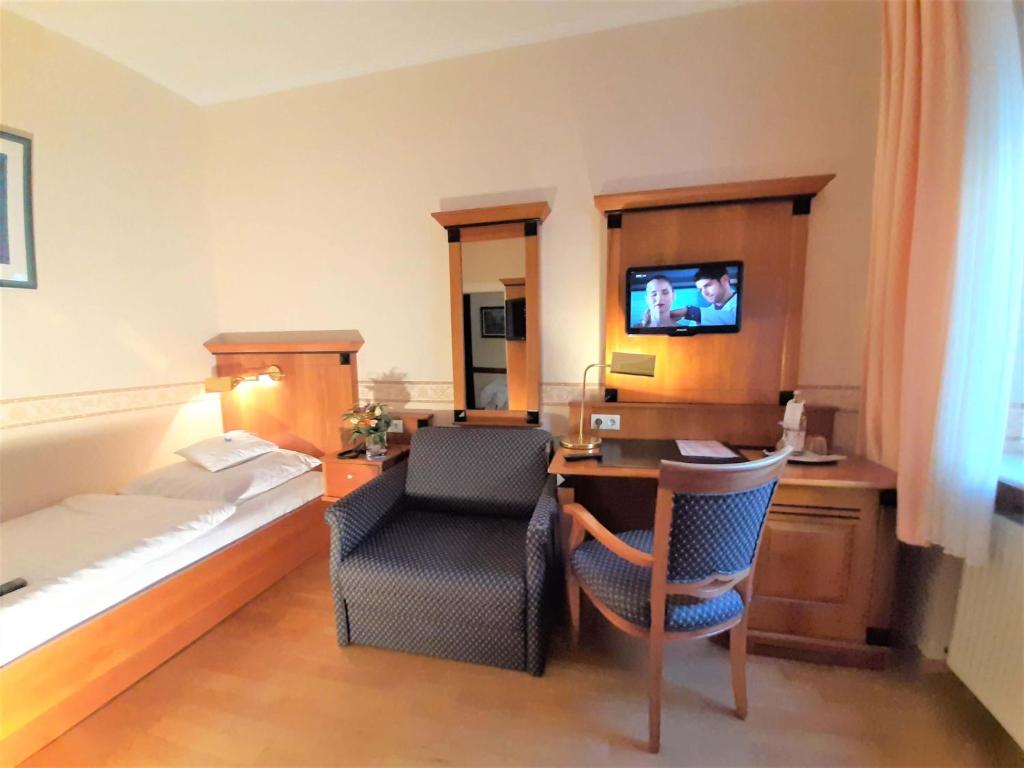 TV a/nebo společenská místnost v ubytování Hotel Krupp