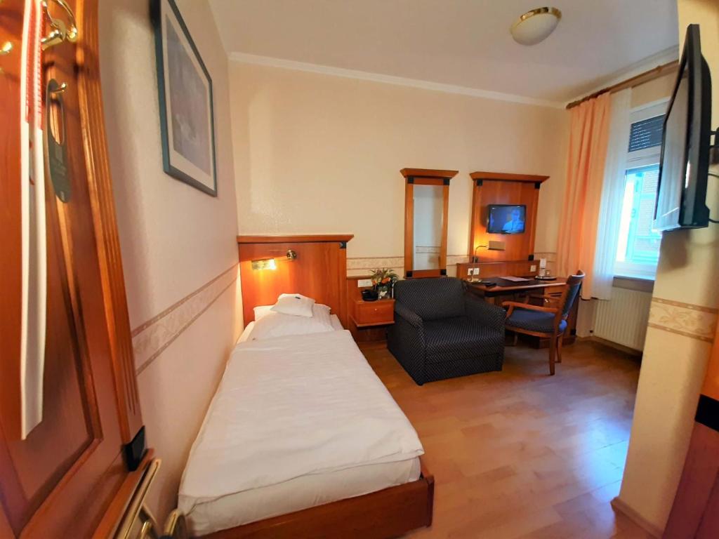 Postel nebo postele na pokoji v ubytování Hotel Krupp