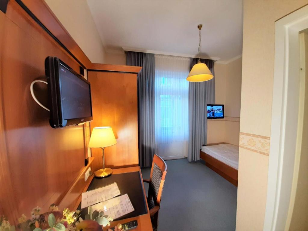 TV a/nebo společenská místnost v ubytování Hotel Krupp