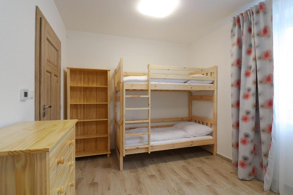 Postel nebo postele na pokoji v ubytování Chata Matzo