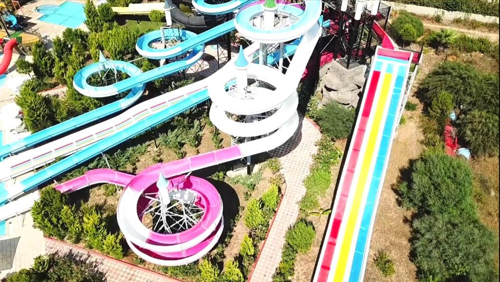 an overhead view of a water park with a roller coaster at 3 bedhroom(200 square meters) near the beach in Lara