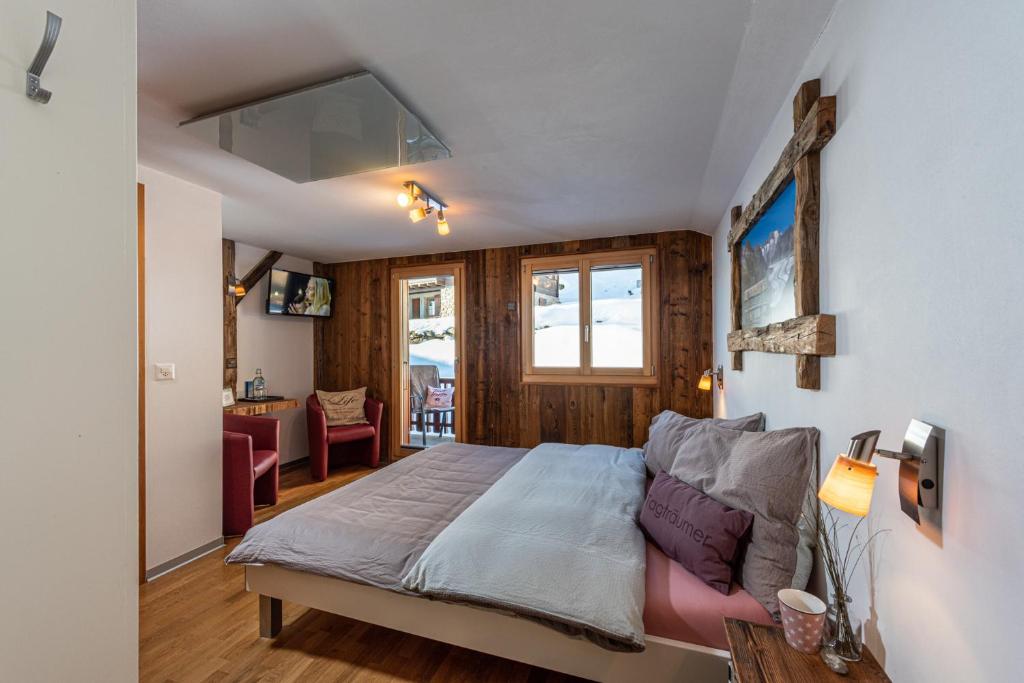 Postel nebo postele na pokoji v ubytování Hotel Slalom