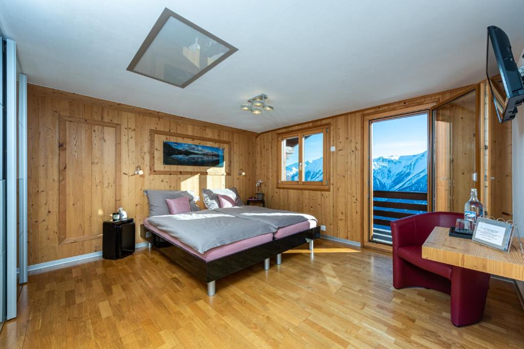 Postel nebo postele na pokoji v ubytování Hotel Slalom