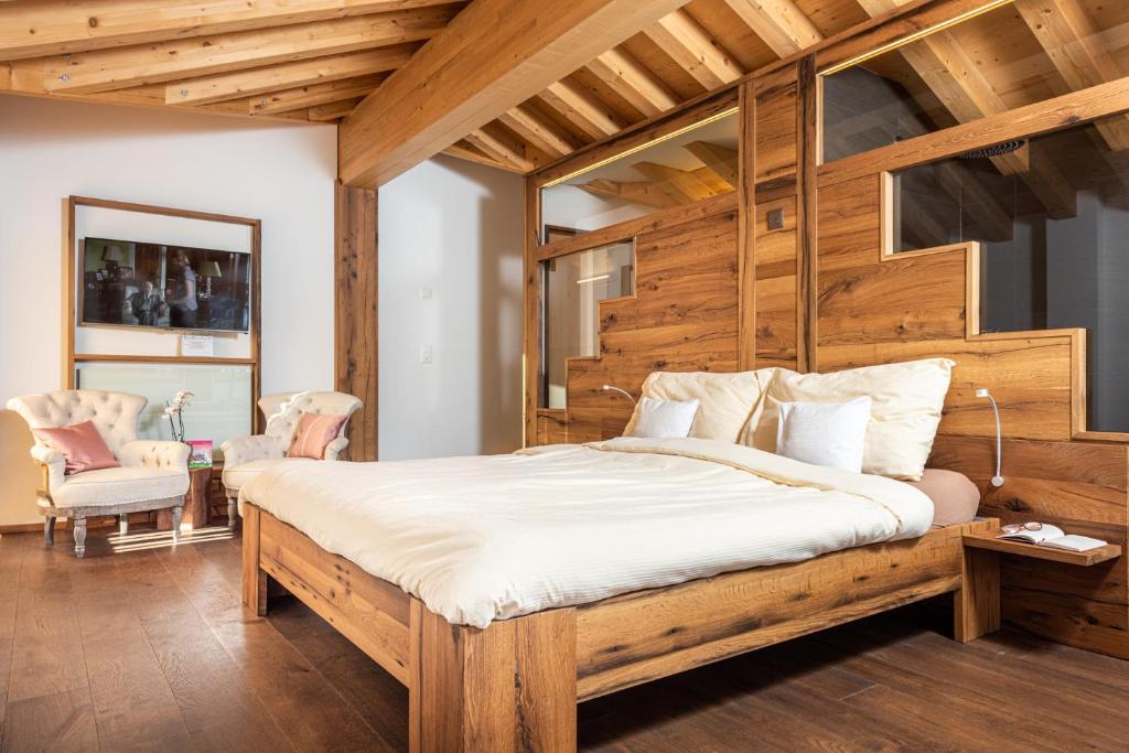 Postel nebo postele na pokoji v ubytování Hotel Slalom