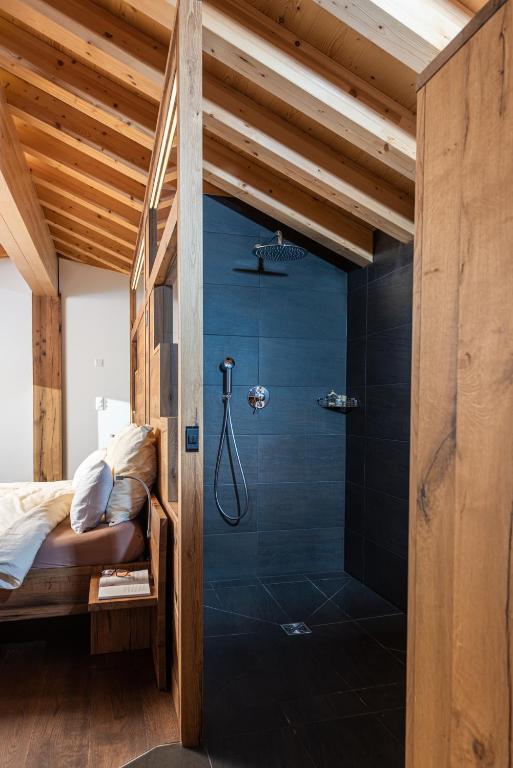Postel nebo postele na pokoji v ubytování Hotel Slalom