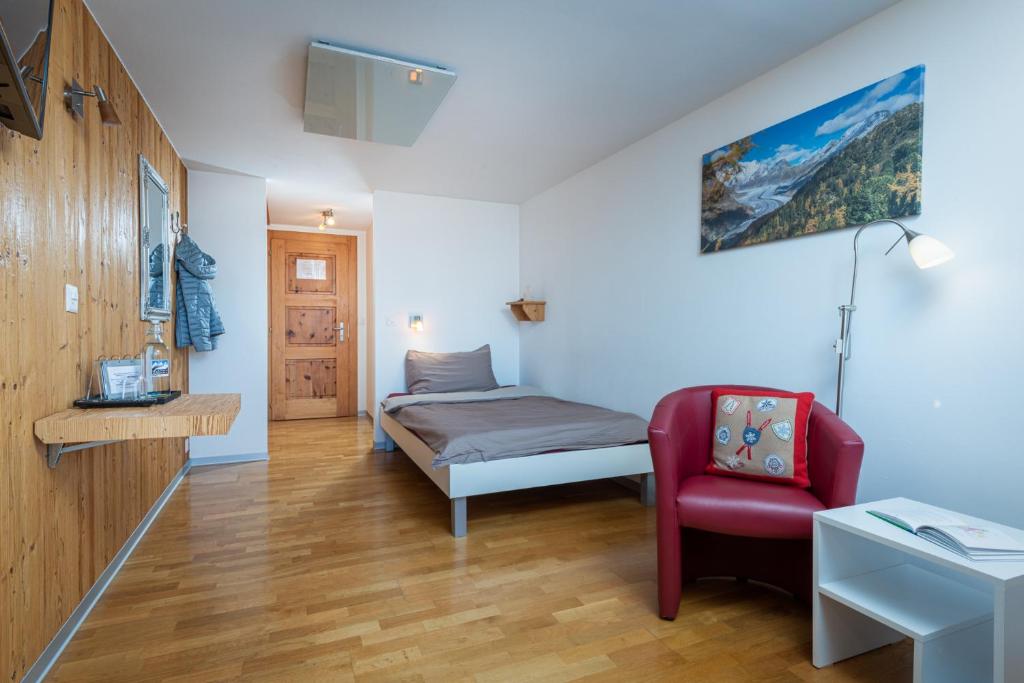 Postel nebo postele na pokoji v ubytování Hotel Slalom