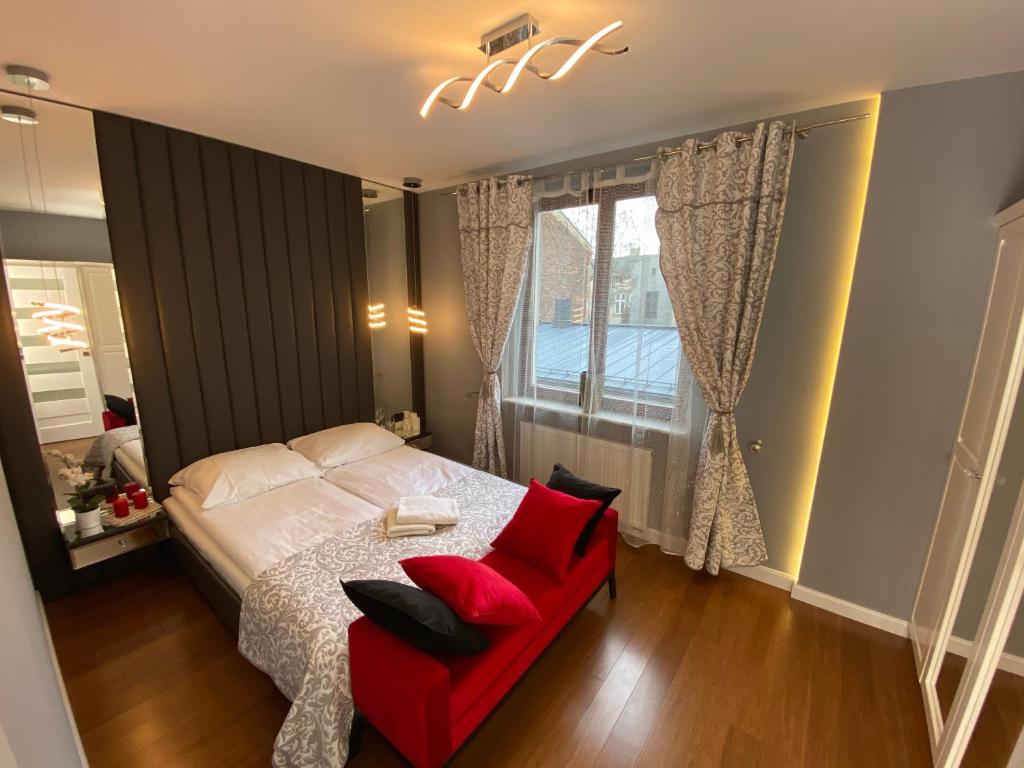 Postel nebo postele na pokoji v ubytování P&J Apartments Lubicz