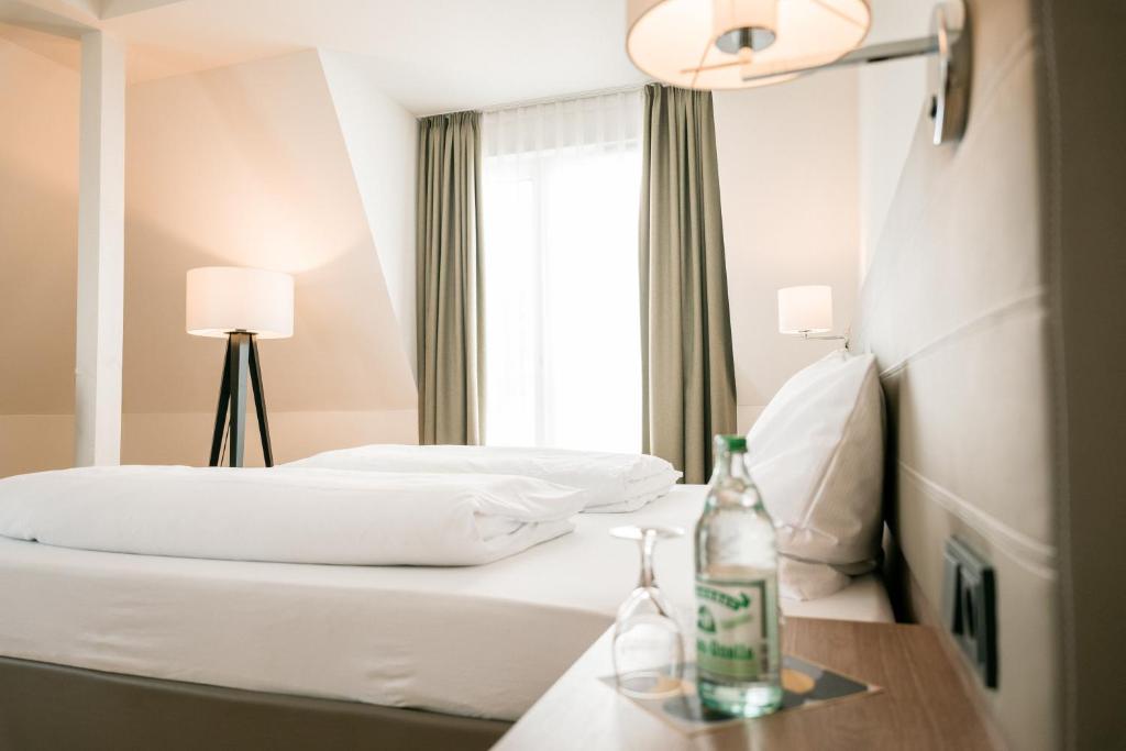 Postel nebo postele na pokoji v ubytování Hotel Trezor