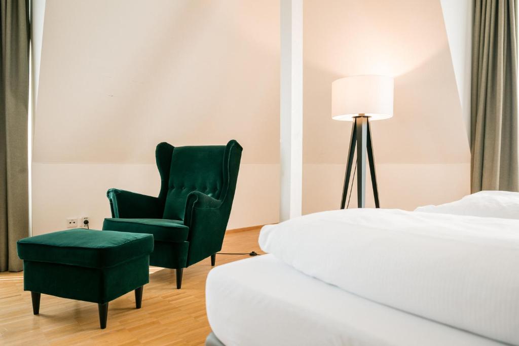 Postel nebo postele na pokoji v ubytování Hotel Trezor
