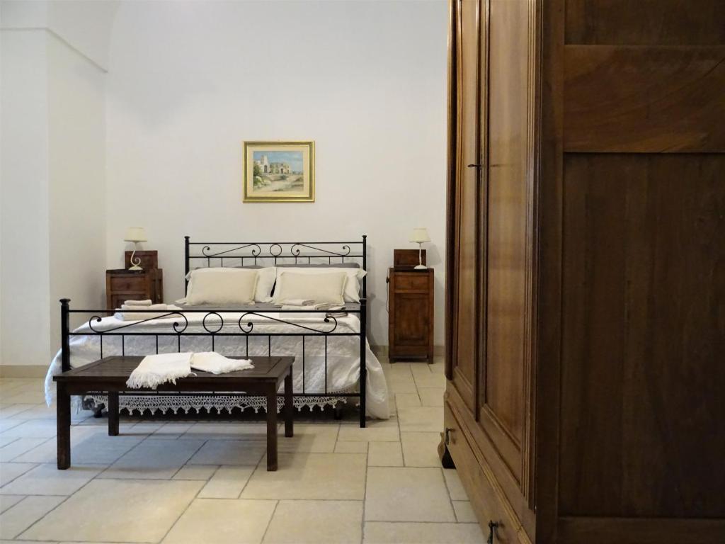Postel nebo postele na pokoji v ubytování Masseria Scianne