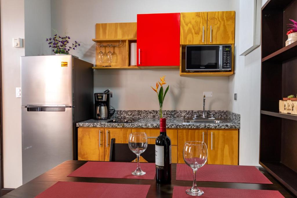 Kuchyň nebo kuchyňský kout v ubytování Apartamentos Equipados RyA del Volcán