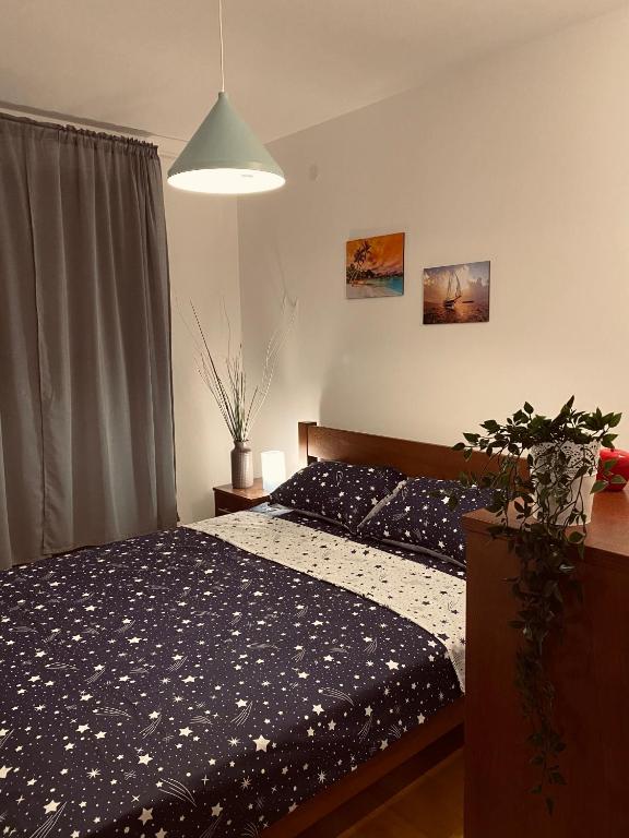 Postel nebo postele na pokoji v ubytování Apartmani Vila Goč