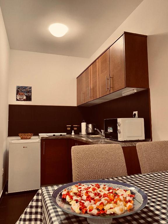 Kuchyň nebo kuchyňský kout v ubytování Apartmani Vila Goč