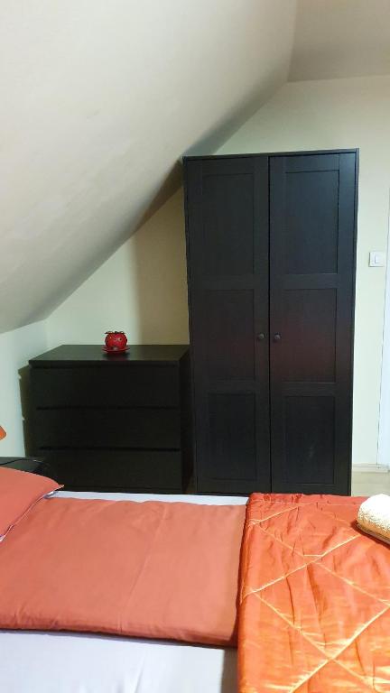 Postel nebo postele na pokoji v ubytování Ruttkai Vendégház
