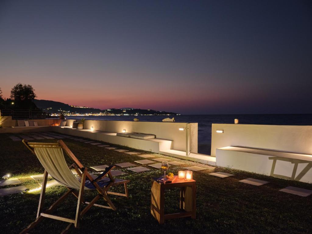 A balcony or terrace at Astarte Villas - Onda Del Mar Beach Villa