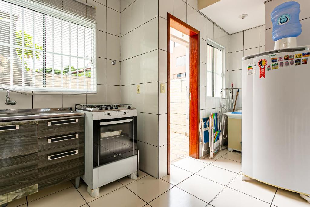  Casa duplex com pátio privativo no Santinho SMR002