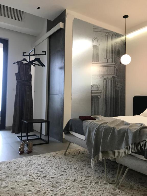 Postel nebo postele na pokoji v ubytování La Fucina di Vulcano
