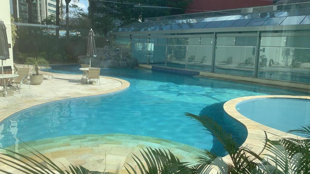 Piscina en o cerca de Vila Olímpia Luxo em Hotel 4 estrelas
