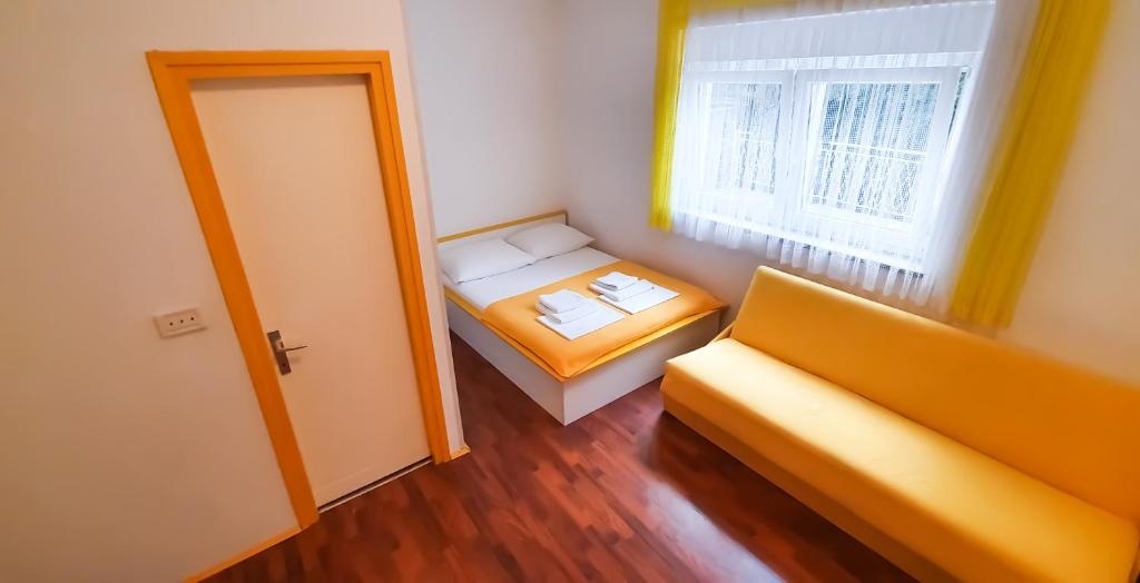 Łóżko lub łóżka w pokoju w obiekcie Apartment Buco