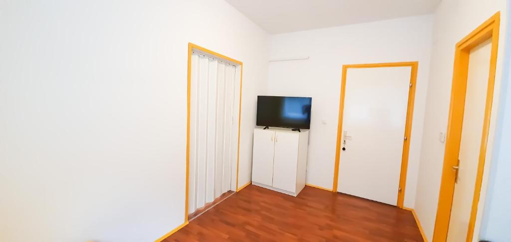 Telewizja i/lub zestaw kina domowego w obiekcie Apartment Buco