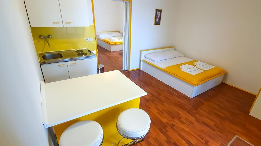 Łóżko lub łóżka w pokoju w obiekcie Apartment Buco