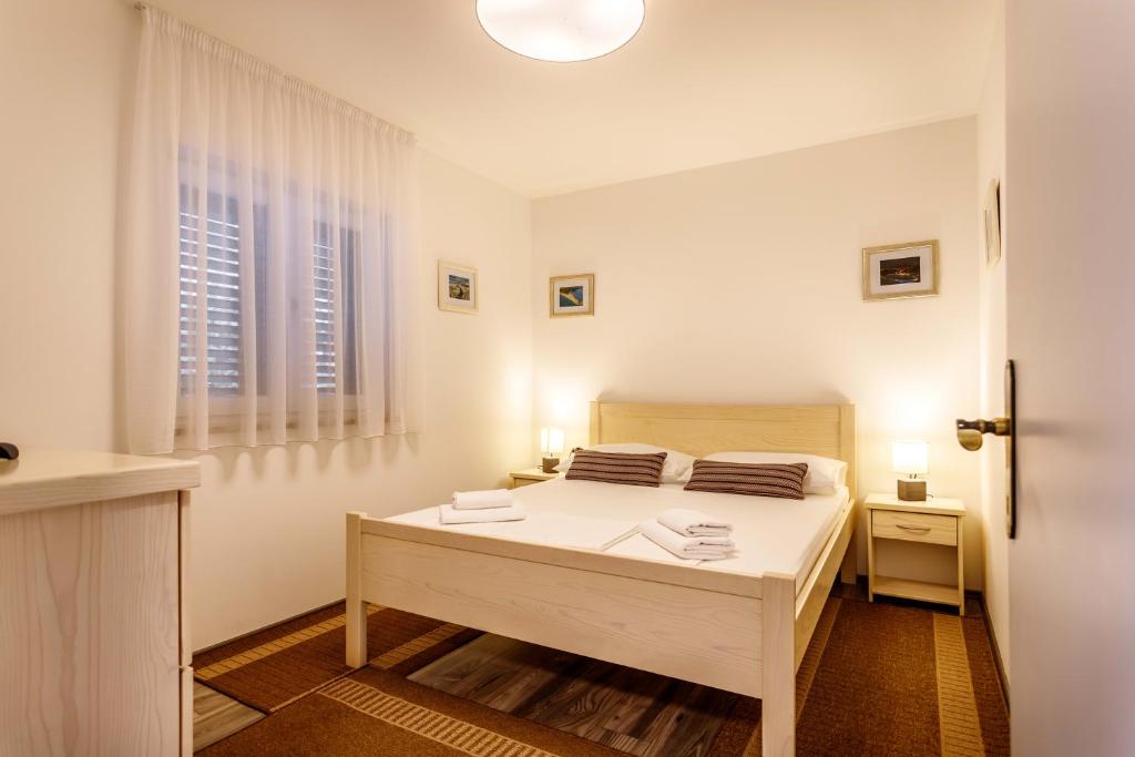 Postel nebo postele na pokoji v ubytování Villa Marija with heated pool