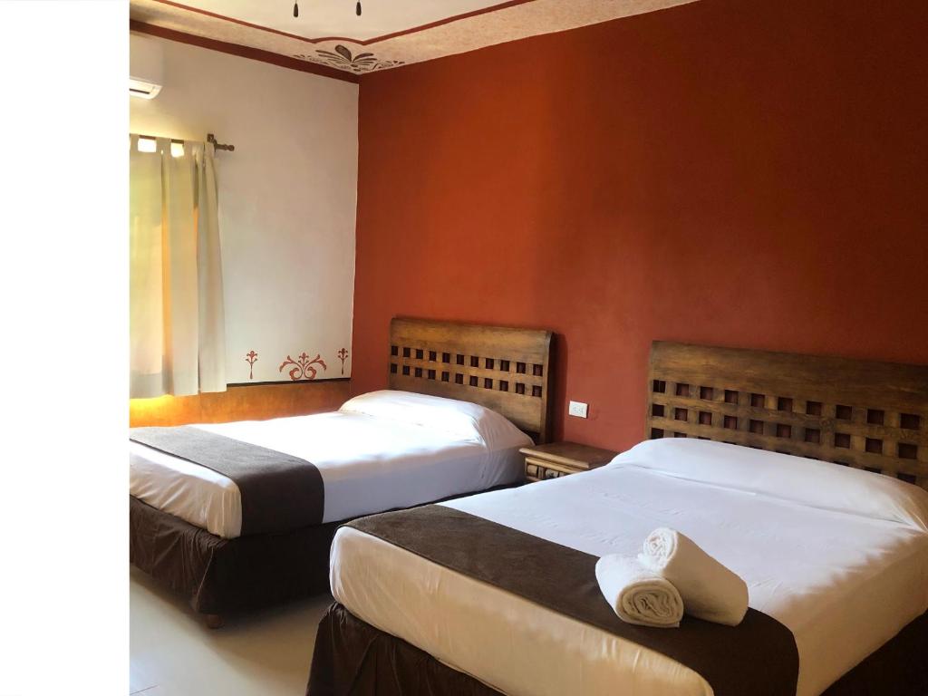 Postel nebo postele na pokoji v ubytování Hotel Tuul