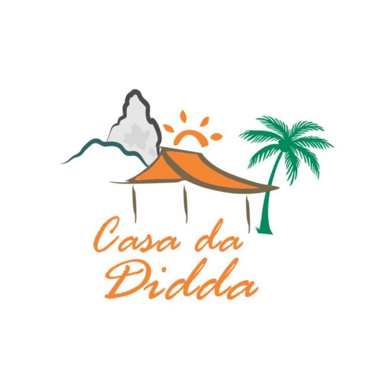 a logo for a durgaurga puja festival with a palm tree at Casa Da Didda in Fernando de Noronha