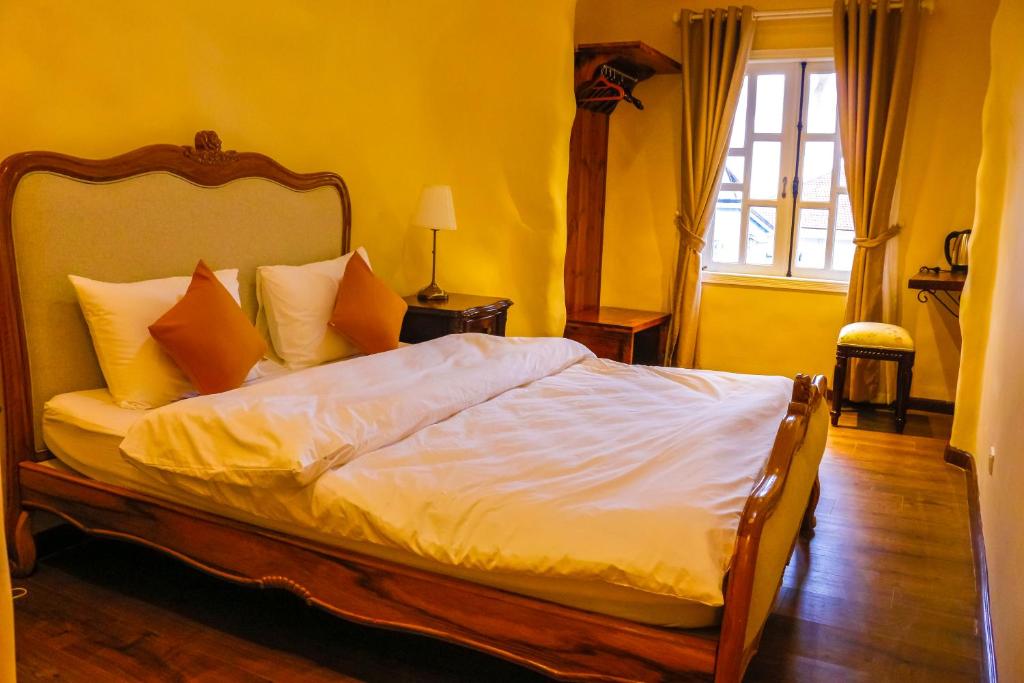 Postel nebo postele na pokoji v ubytování Crazy House