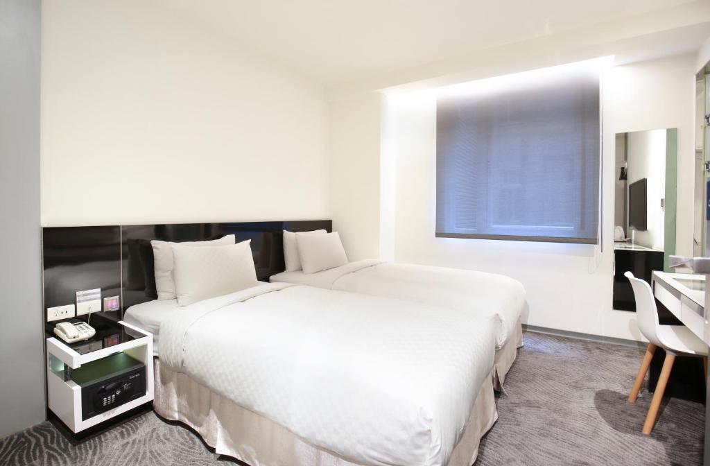 TV a/nebo společenská místnost v ubytování CityInn Hotel Plus - Taichung Station Branch