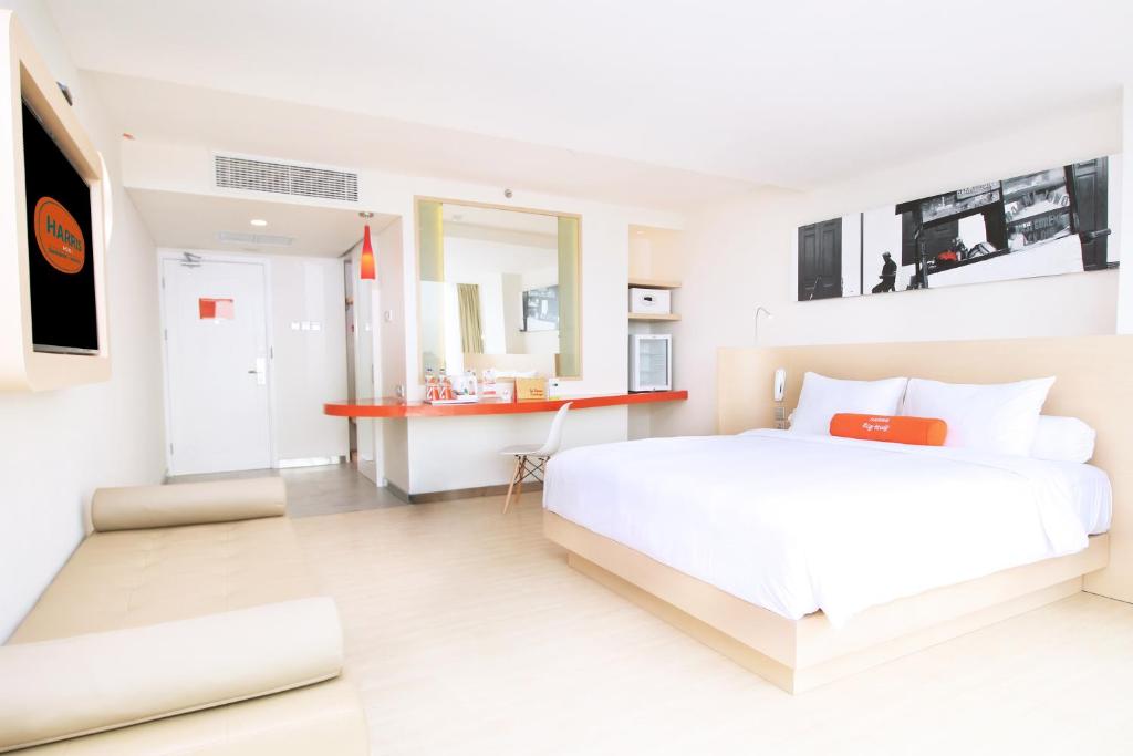 Voodi või voodid majutusasutuse HARRIS Hotel Sentraland toas