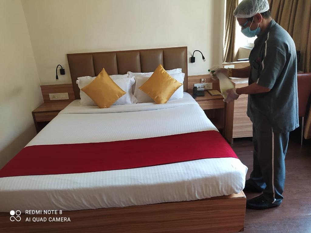 Postel nebo postele na pokoji v ubytování Hotel Plaza