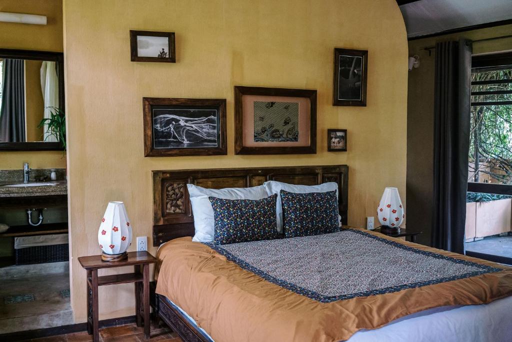 Postel nebo postele na pokoji v ubytování An Villa boutique resort