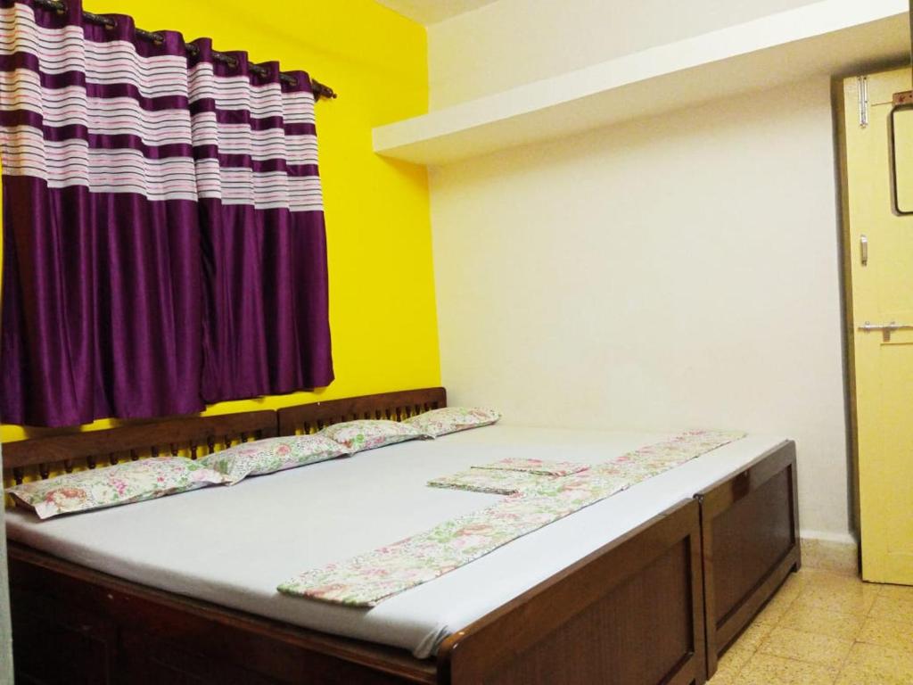 Postel nebo postele na pokoji v ubytování Shalom Guest House