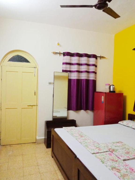 Postel nebo postele na pokoji v ubytování Shalom Guest House