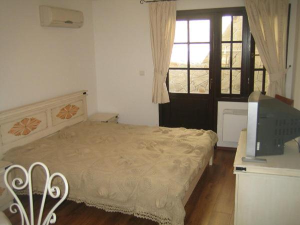 Postel nebo postele na pokoji v ubytování Gurko Hotel