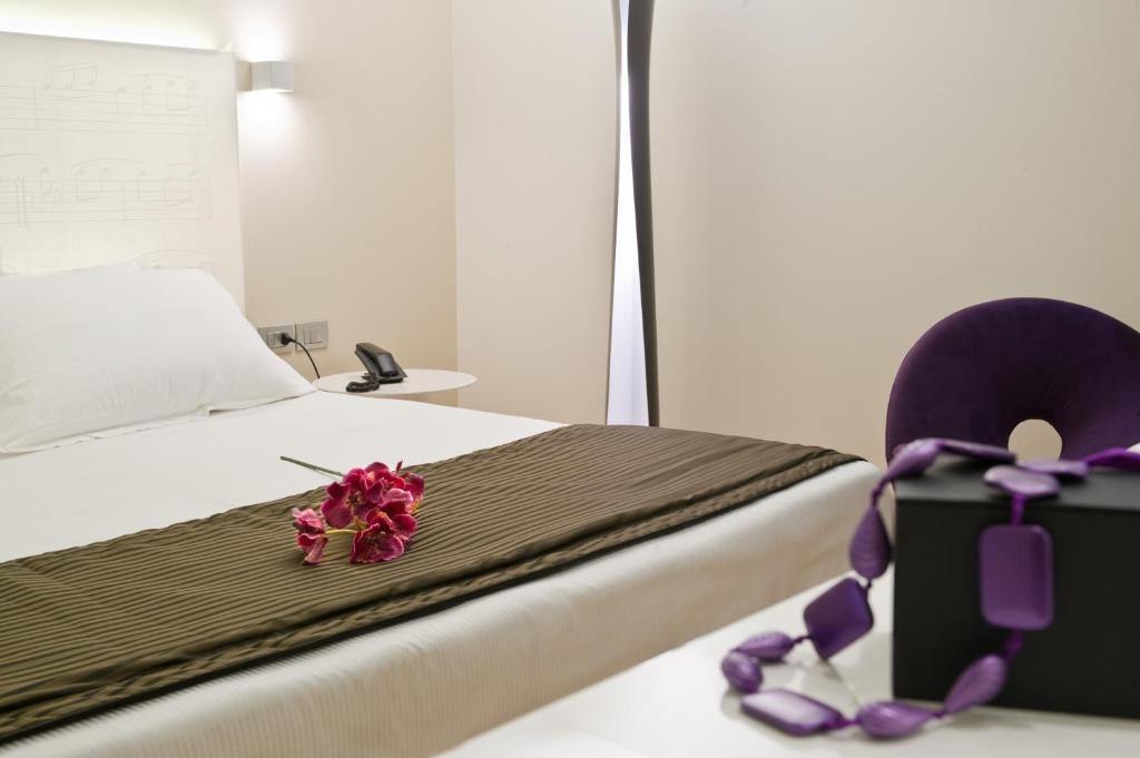 Posteľ alebo postele v izbe v ubytovaní Hotel Coppe Trieste - Boutique Hotel