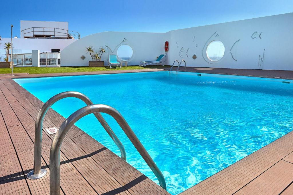 Bazén v ubytování Hotel Lancelot nebo v jeho okolí