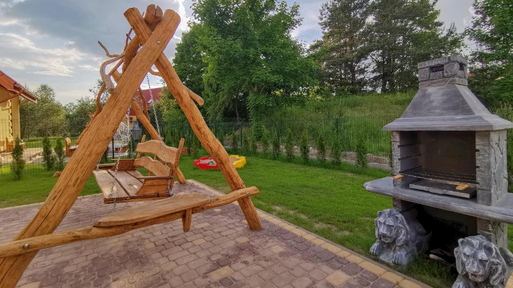 Vonkajšia záhrada v ubytovaní Luksusowe domy na Mazurach nad jeziorem 1