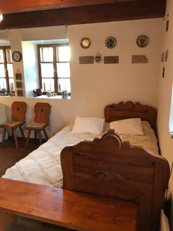 Postel nebo postele na pokoji v ubytování Káli KŐ Apartman