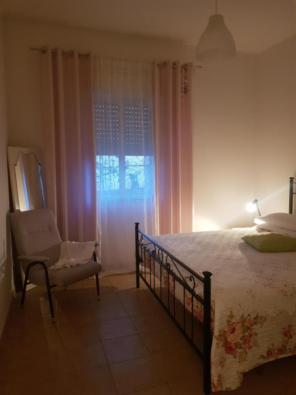 A bed or beds in a room at Casa di Campagna