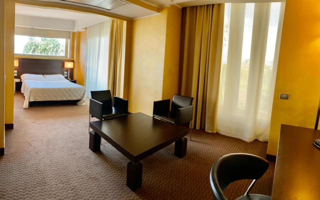Voodi või voodid majutusasutuse E' Hotel toas