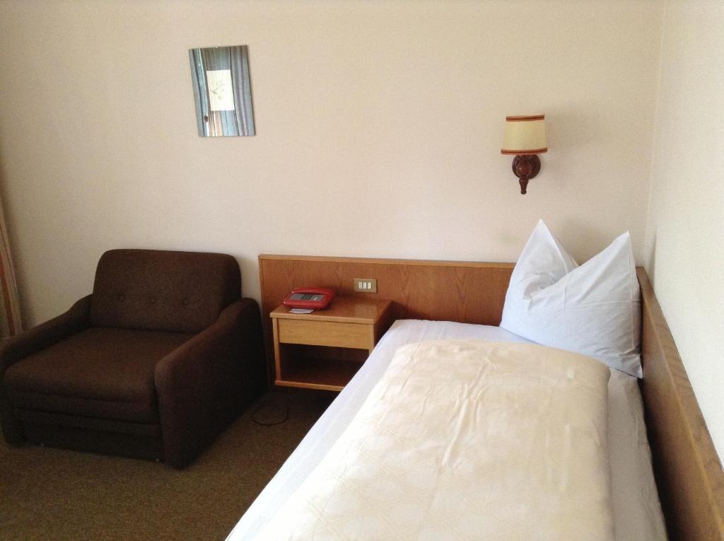 Postel nebo postele na pokoji v ubytování Hotel Tannerhof