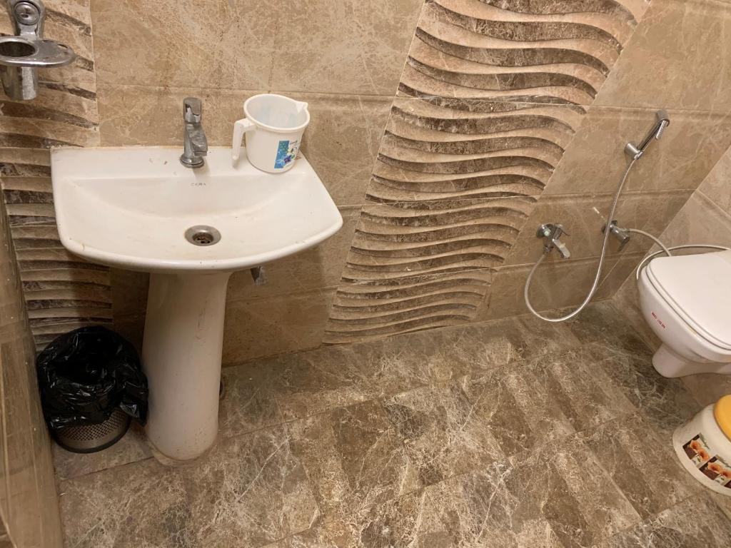 Koupelna v ubytování Hotel Ashoka Ganages