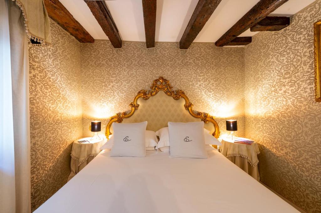 Postelja oz. postelje v sobi nastanitve Hotel Antico Doge - a Member of Elizabeth Hotel Group