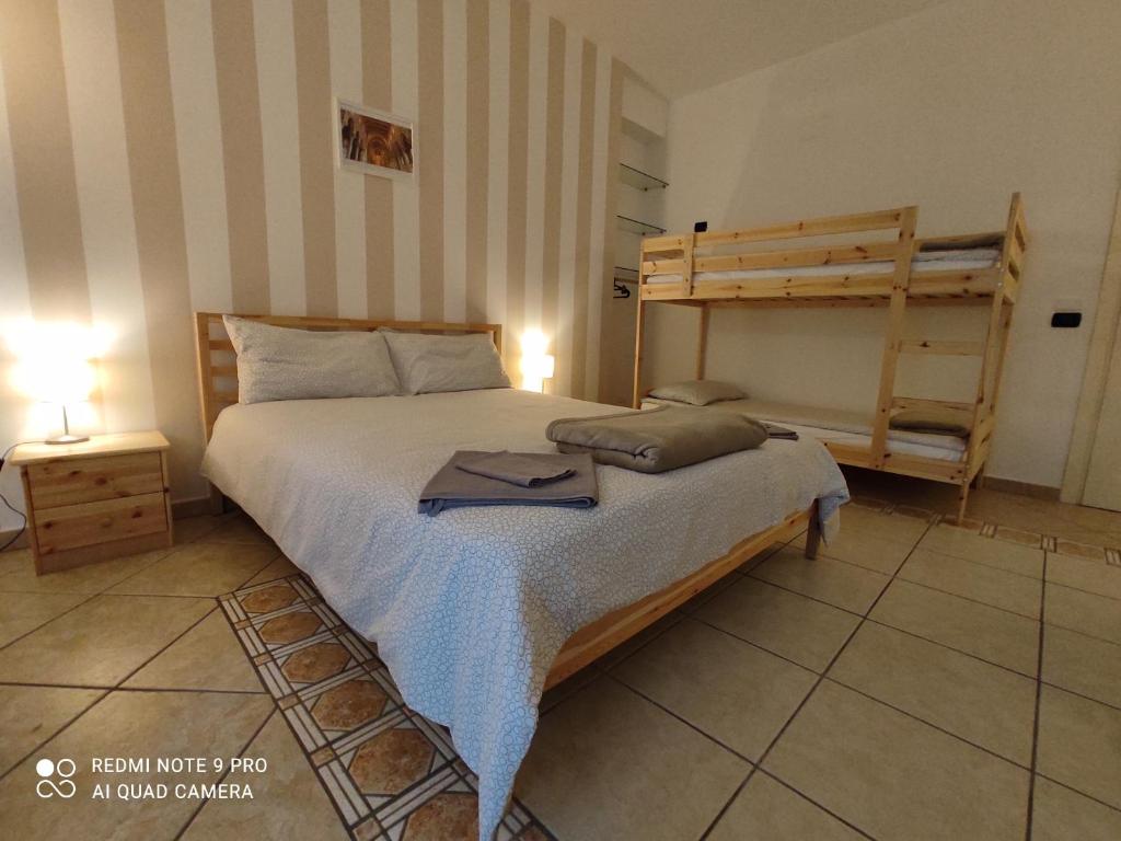 Postel nebo postele na pokoji v ubytování Atelier bed&bed